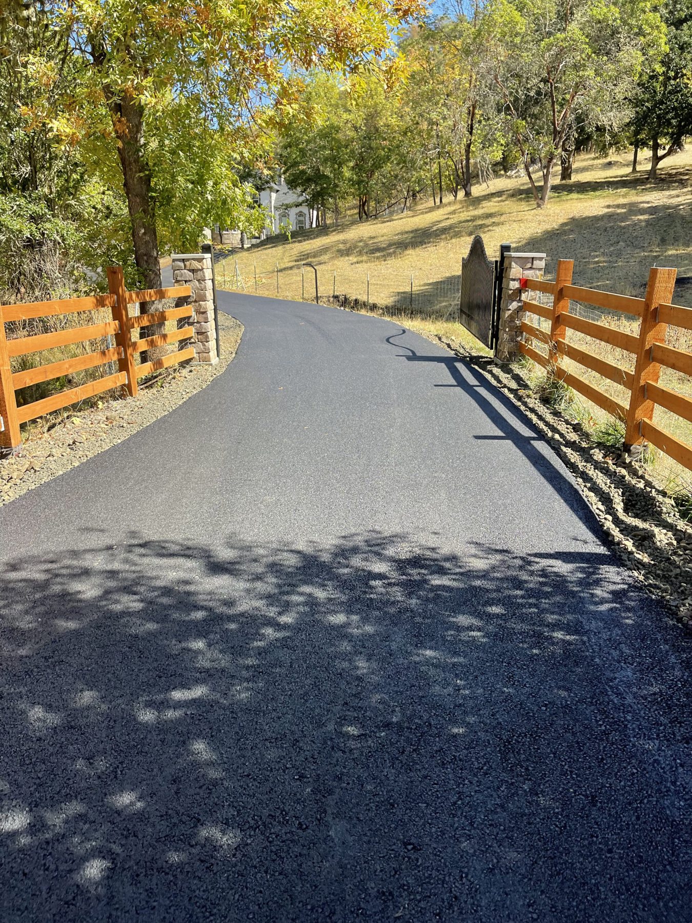 Paved driveway shown in Custom Paving’s project gallery
