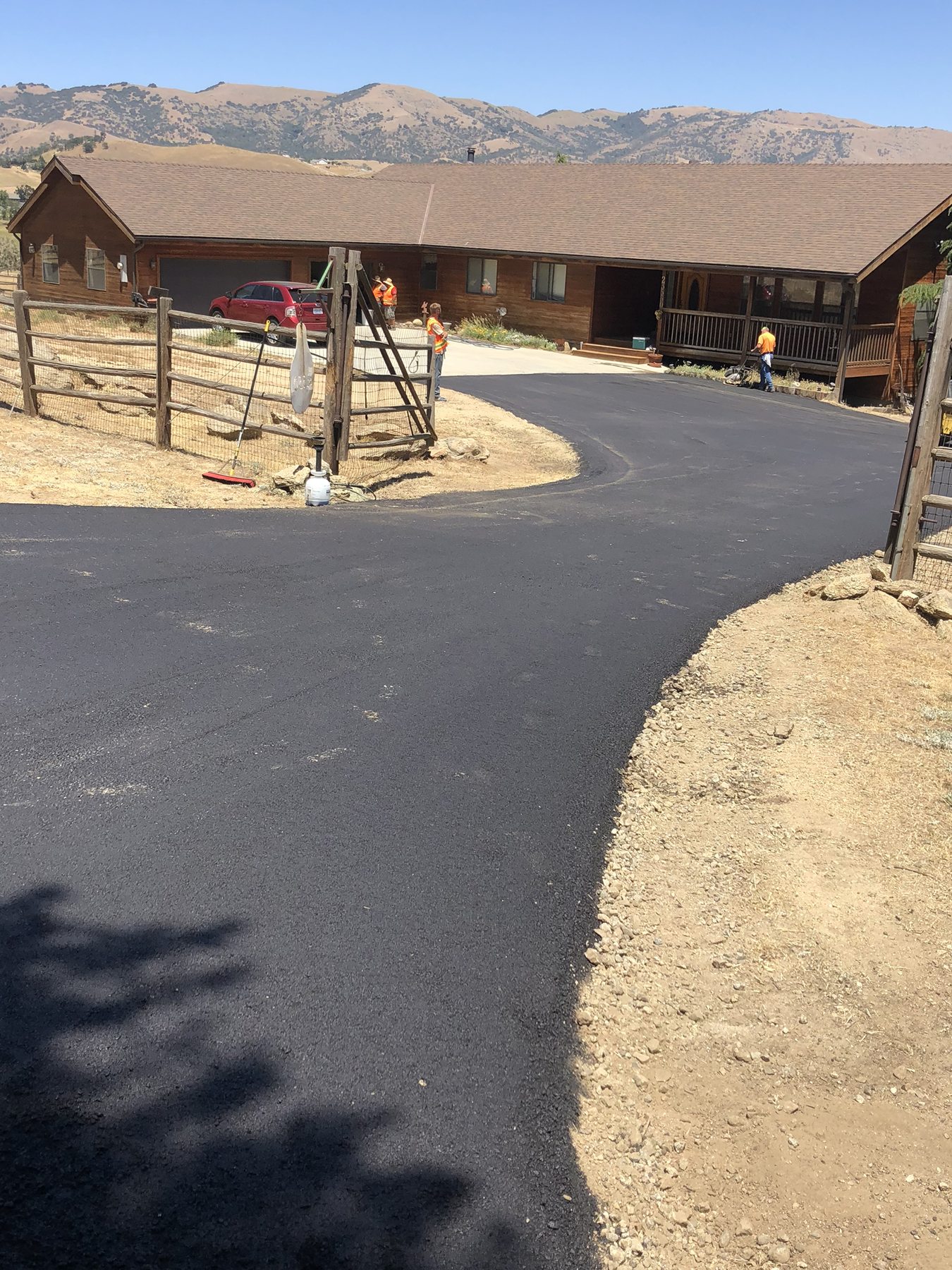 Asphalt driveway from Custom Paving’s existing project gallery