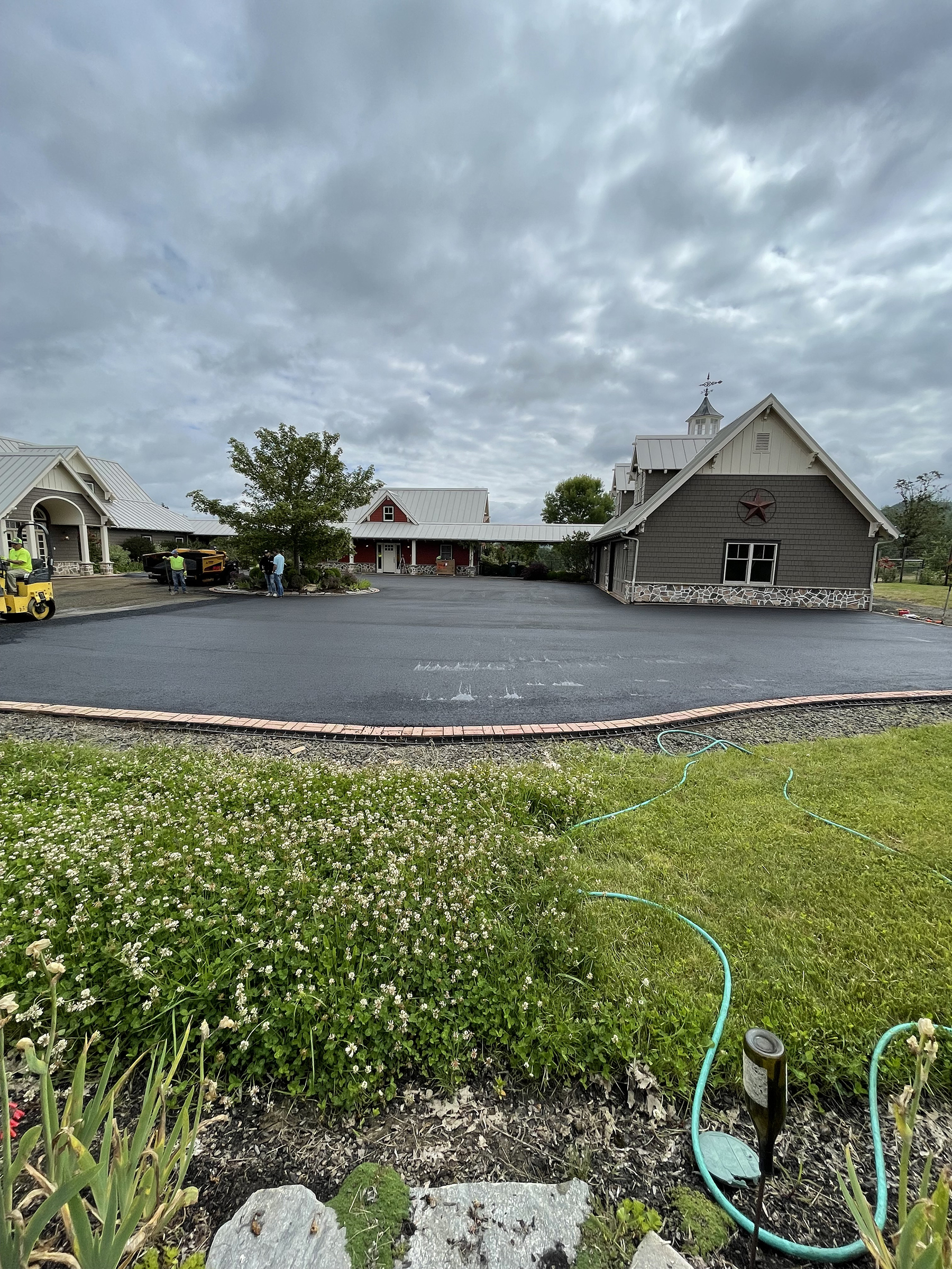 Large Driveway and Courtyard paved in Asphalt